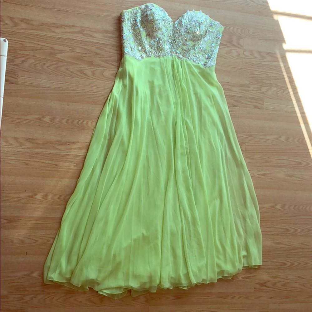 A beautiful lime green prom dress with sequence